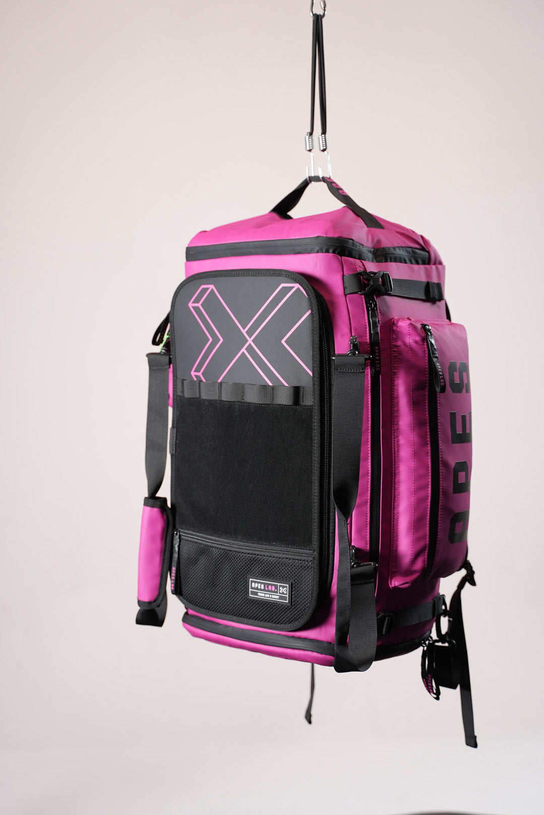 Sac à dos Monolite XL - 55 L & Sac de voyage rose mexicain