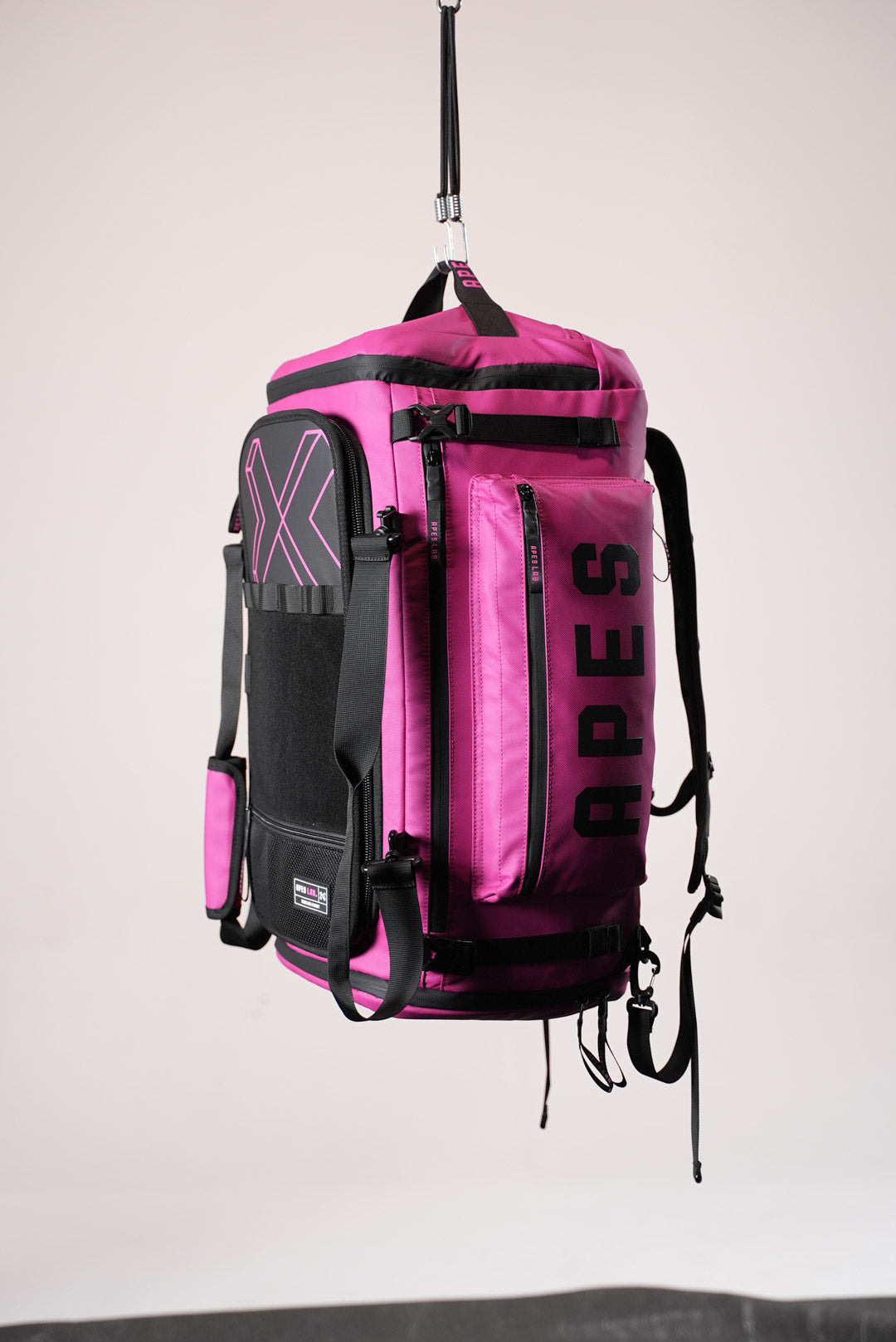 Sac à dos Monolite XL - 55 L & Sac de voyage rose mexicain