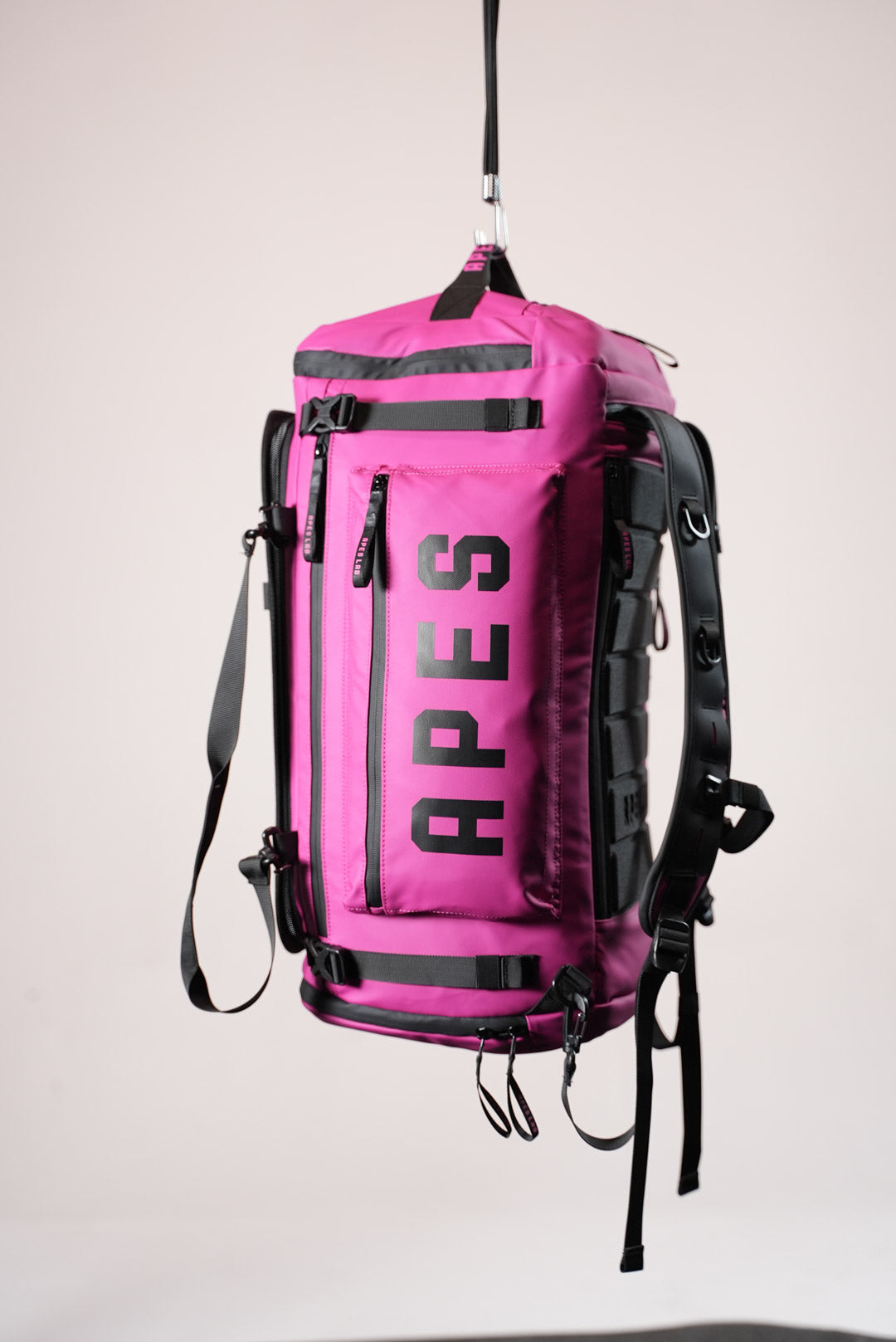 Sac à dos Monolite XL - 55 L & Sac de voyage rose mexicain