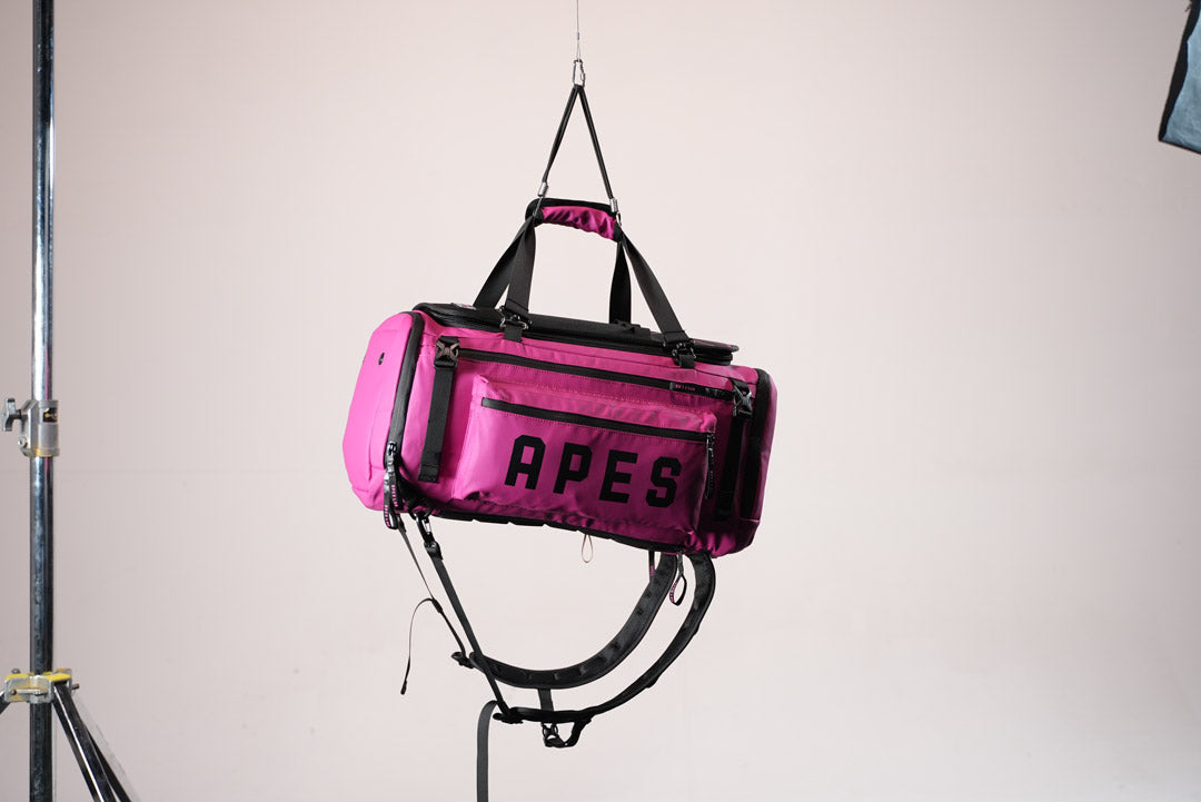 Sac à dos Monolite XL - 55 L & Sac de voyage rose mexicain